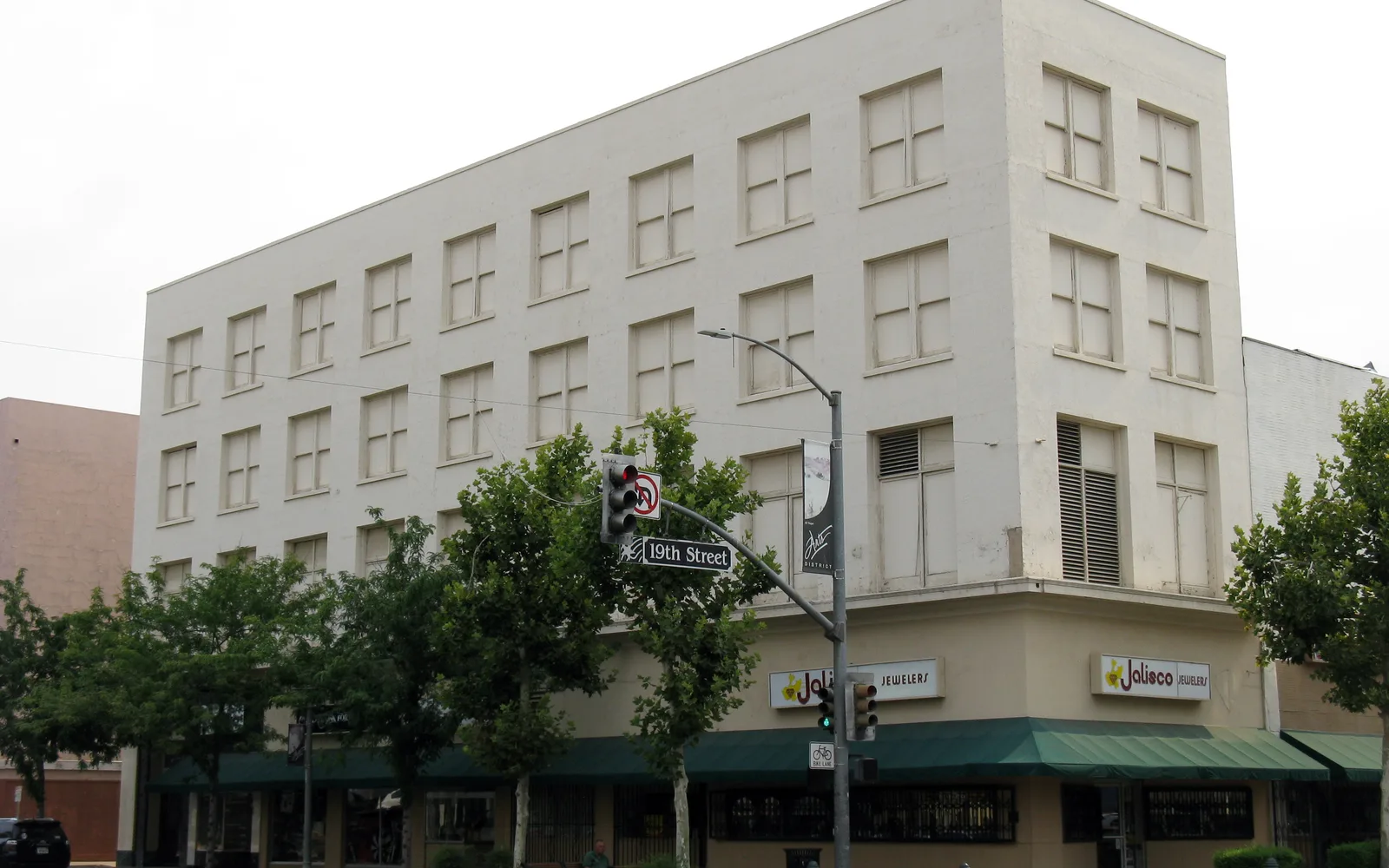 The Hopkins Building, a historic brick commercial structure with distinctive early 1900s architecture
